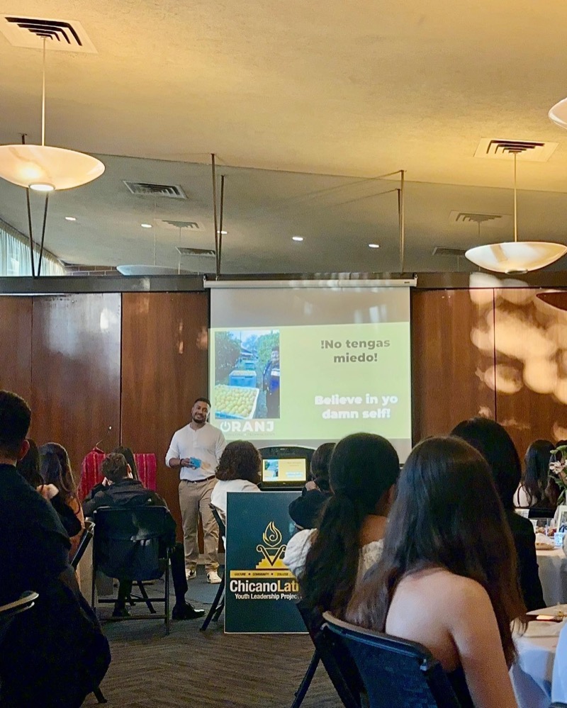 Alex giving a keynote at the Chicano Latino Youth Leadership Project