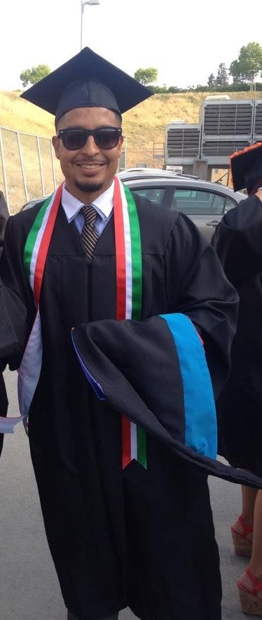 Alex on the day he received his master's degree
